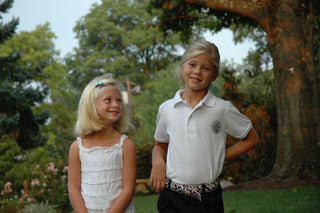 The founders of STOW Apparel at a young age as sisters.